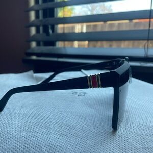 Black Sunglasses with Red and Gold Accents
